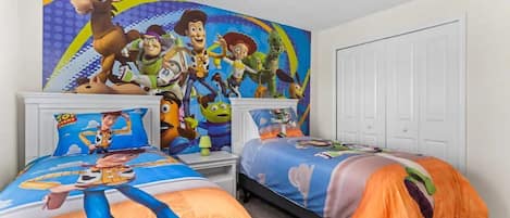 Your kids will enjoy this unique Toy Story room, with two comfortable twin beds.