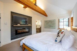 Primary bedroom: King bed, gas fireplace, TV, ensuite