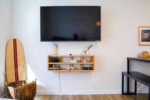 50" 4k Roku Smart TV in main living room (Disney+, ESPN+, & Hulu provided).