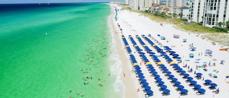 Beautiful Gulf Coast with beach chair and umbrella rentals