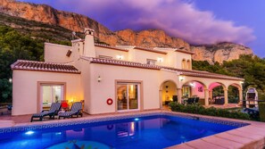 Pool and House at Night