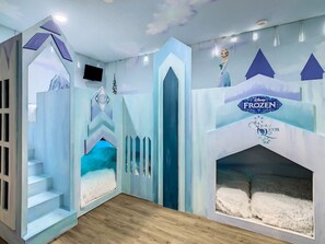 Frozen Castle Bunks have two full size beds and four twin size beds and a slide