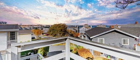 Private deck & roof deck (not to be accessed from Nov-Apr for liability reasons), accessed from the master bedroom, with views of the Atlantic Ocean