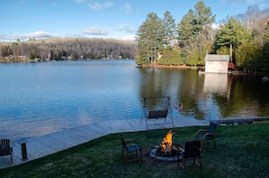 View of the bay and firepit from the deck