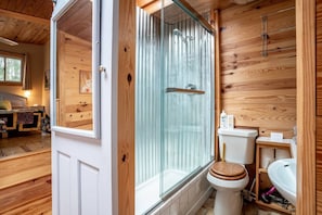 Ah yeah....there's that shower with a 'barn door slider for privacy....