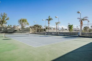 Show off your back swing at one of several tennis courts on property!