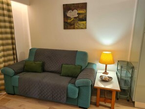 sala com sofá cama duplo