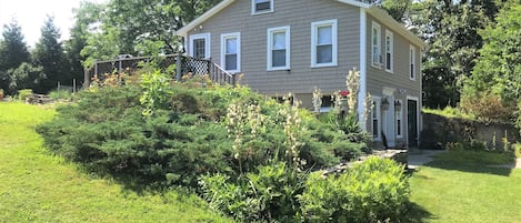 The space is on the top floor of the farmhouse. It has a private entrance & deck