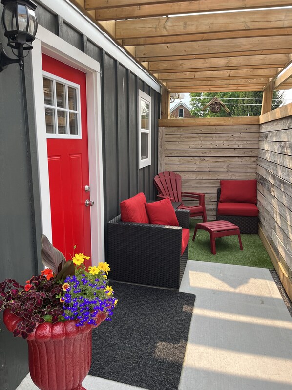 Entrance way and outdoor patio seating area