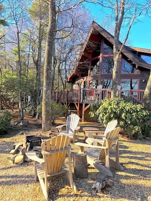 Timber Frame Craftsman style Mountain home with. Fire pit overlooking the long range Mountain views.