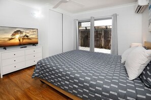 Bedroom, queen size bed, air conditioned with smart TV