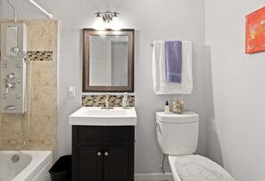 Bathroom on main floor with jet shower panel 