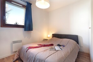 Two bedrooms each feature a Double bed.