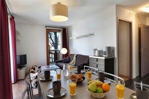 Share meals and laughs at the dining table.
