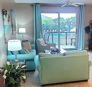 Living Area Overlooking Resort Zero-Entry Pool with Mushroom Fountain