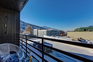 Private deck overlooking Historic Main Street