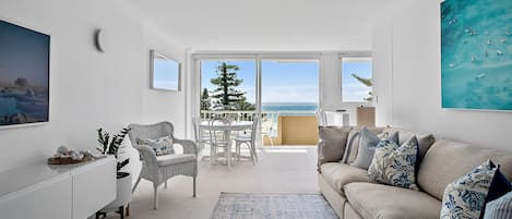 This is a beautifully renovated beachfront apartment.