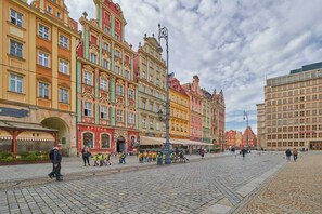 A vibrant street view showcasing the historic and colorful architecture of the neighborhood.