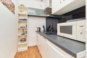 View of the well-equipped kitchen.