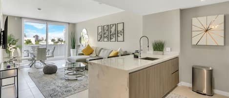 White marble peninsula offers extra cooking space