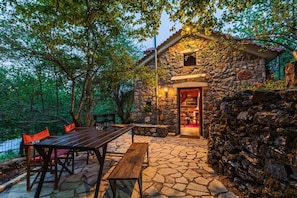 When night falls, the house glows warmly, inviting you to relax.