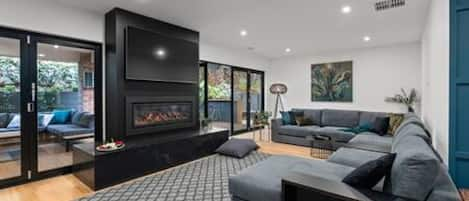 Large open plan living with gas fireplace