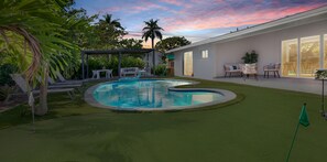 Welcome to our family paradise! Endless fun awaits in our backyard.