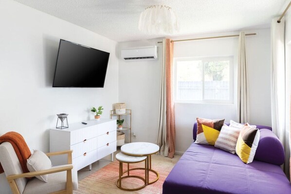 Your modern living room artfully designed for your stay!