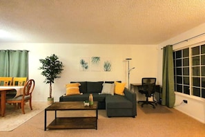 Gaze into your living room with a stunning warm design!