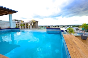 Clean and beautiful Pool. 24 hr access on top of roof.  Over looking city. 