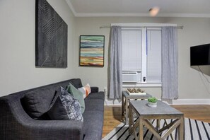 Window-type AC/Heater installed so you could adjust the temperature the way you want it while watching from your couch