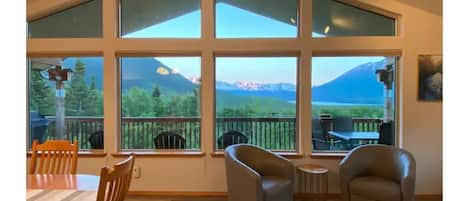 Living room looking out onto deck with amazing views 