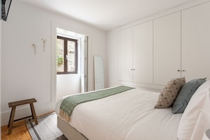 The warm and inviting second bedroom offers a double-size bed to enjoy much-needed rest after a long day travelling.
