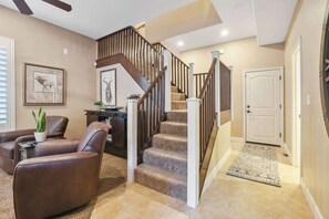 The stairs lead to all the bedrooms 