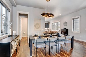 Stunning Dining Room Area With Seating For 8 People
