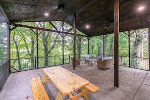 Enjoy bug free meals on the screened in patio overlooking the river!