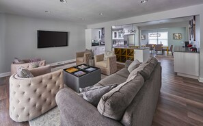 Spacious, and updated living area opens into the kitchen and dining area