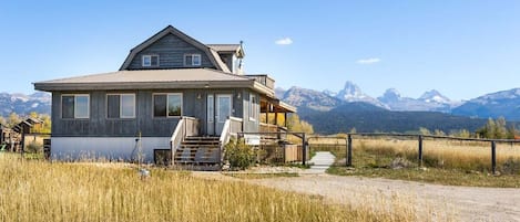 Take in beautiful, obstructed views of the Tetons from the comfort of this well-appointed family home.