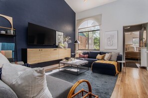 Living room and entryway. Bedrooms are on either side of living space.