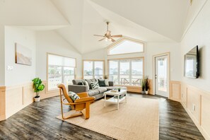 Bright and airy living area with wall of windows