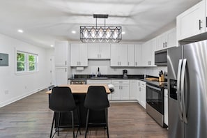 Prepare your favorite meals in the spacious, fully equipped kitchen.