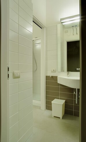 Get ready for your day in the lovely bathroom.