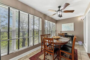 Spacious Enclosed Patio for Dining.