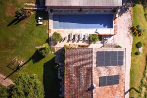 Outside: Heated swimming pool - Terraces - Plancha - Table for 14 people - Sofa - Table tennis - Play area with tree house, trampoline, swing and slide - Petanque pitch + boules.