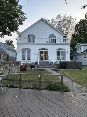 Back view of the house with outdoor kitchen and jacuzzi 