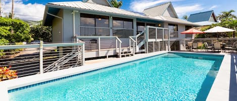 Sparkling pool, deck and back patio