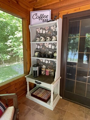 Enjoy your morning coffee in the screened in porch.