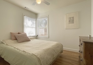 2nd bedroom w/queen bed (new mattress & frame!), gentle light, closet + dresser