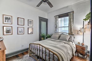 [Bedroom 1] Main Floor with Queen Size Bed and 54" Smart TV