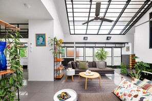 Internal courtyard sitting room beside fishpond.